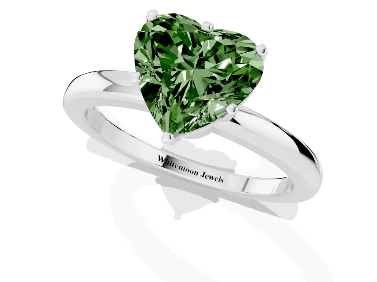 Fancy Green Heart Cut Solitaire Diamond Ring with Six-Prong Setting on a Classic Band Silver
