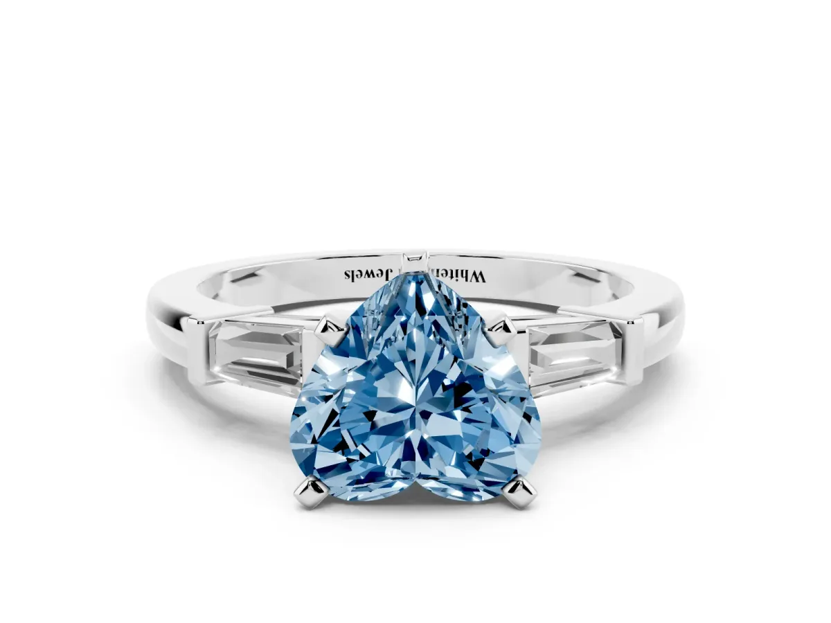 Fancy Blue Heart Cut Cut Diamond Solitaire Ring with Tapered Baguette Accents and Four-Prong Setting Silver