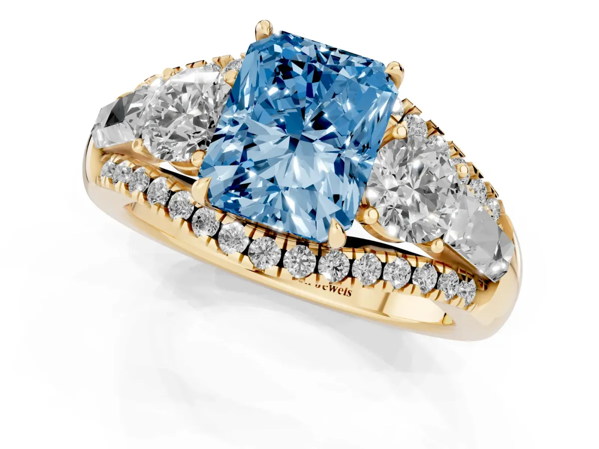 Fancy Blue Three-Stone Radiant Cut Diamond Engagement Ring with Pave Band and Prong Setting Yellow gold