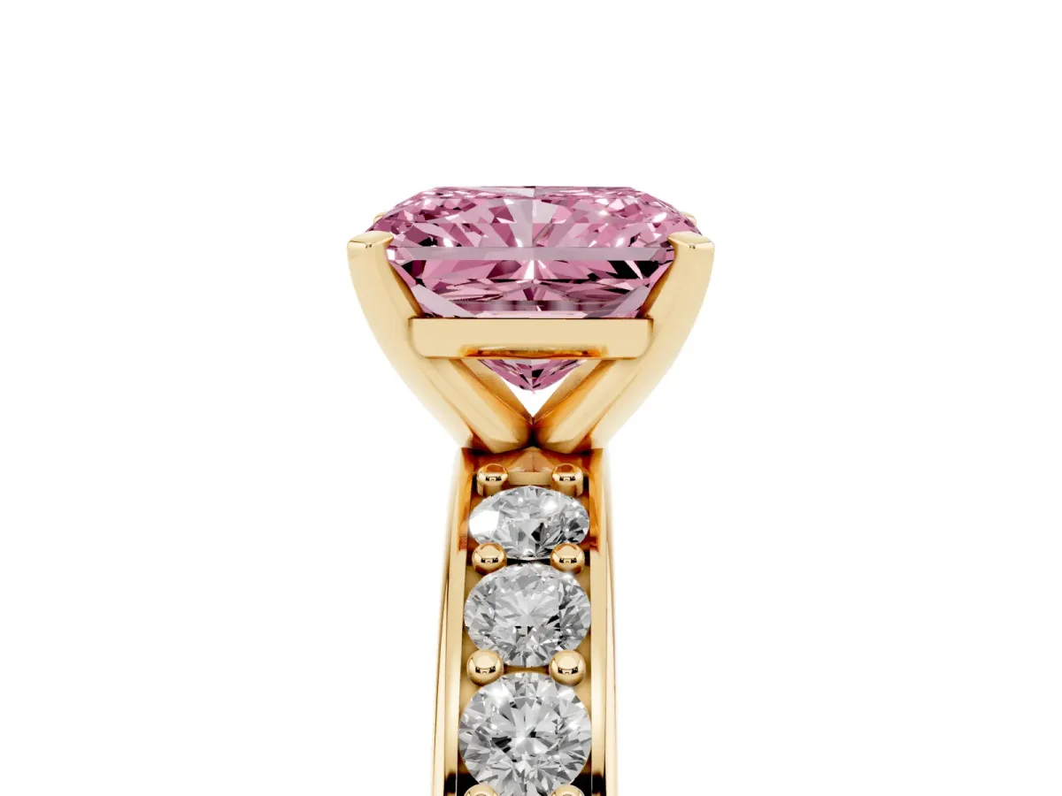 Fancy Pink Radiant Cut Diamond Engagement Ring with Channel Set Round Band and Prong Setting Yellow gold