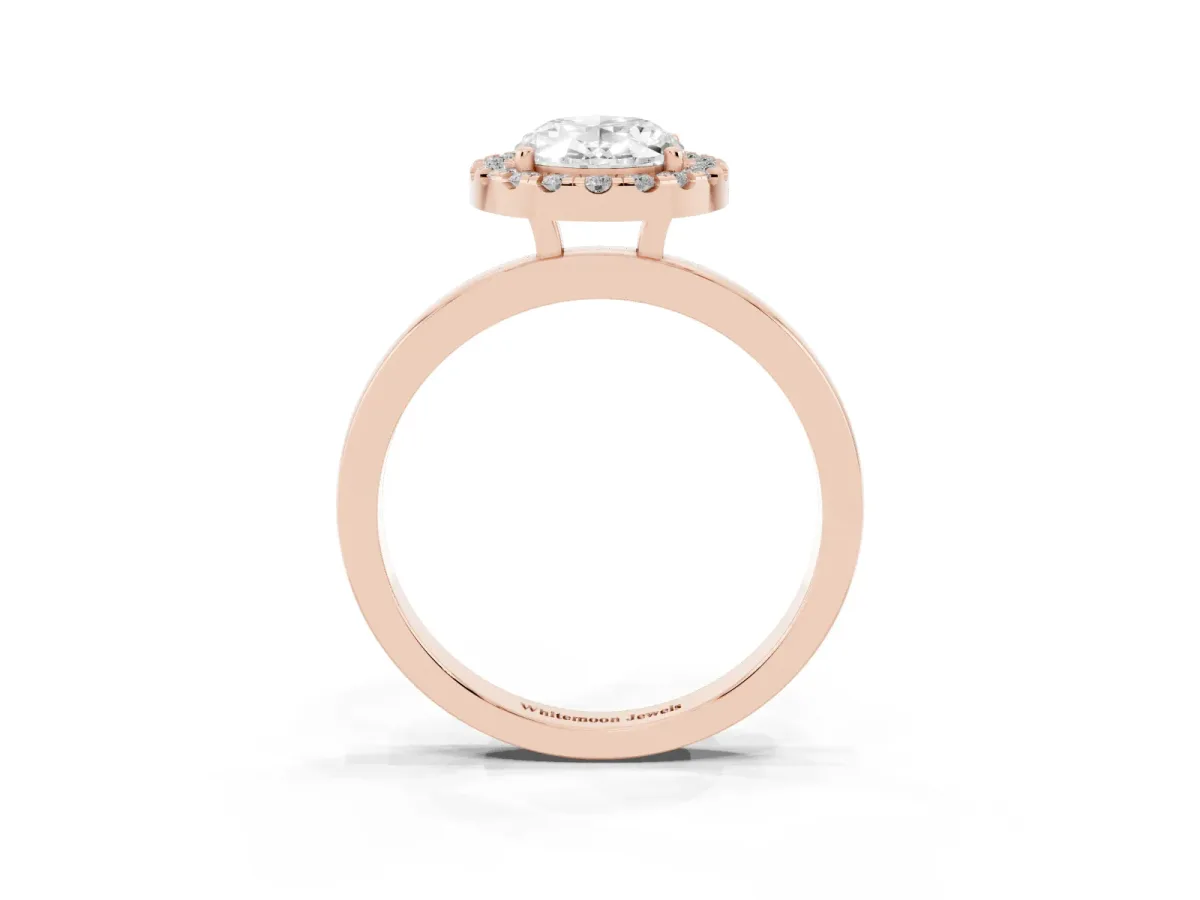 Oval Cut Halo Diamond Solitaire with Pavé Band and Four-Prong Setting Rose gold