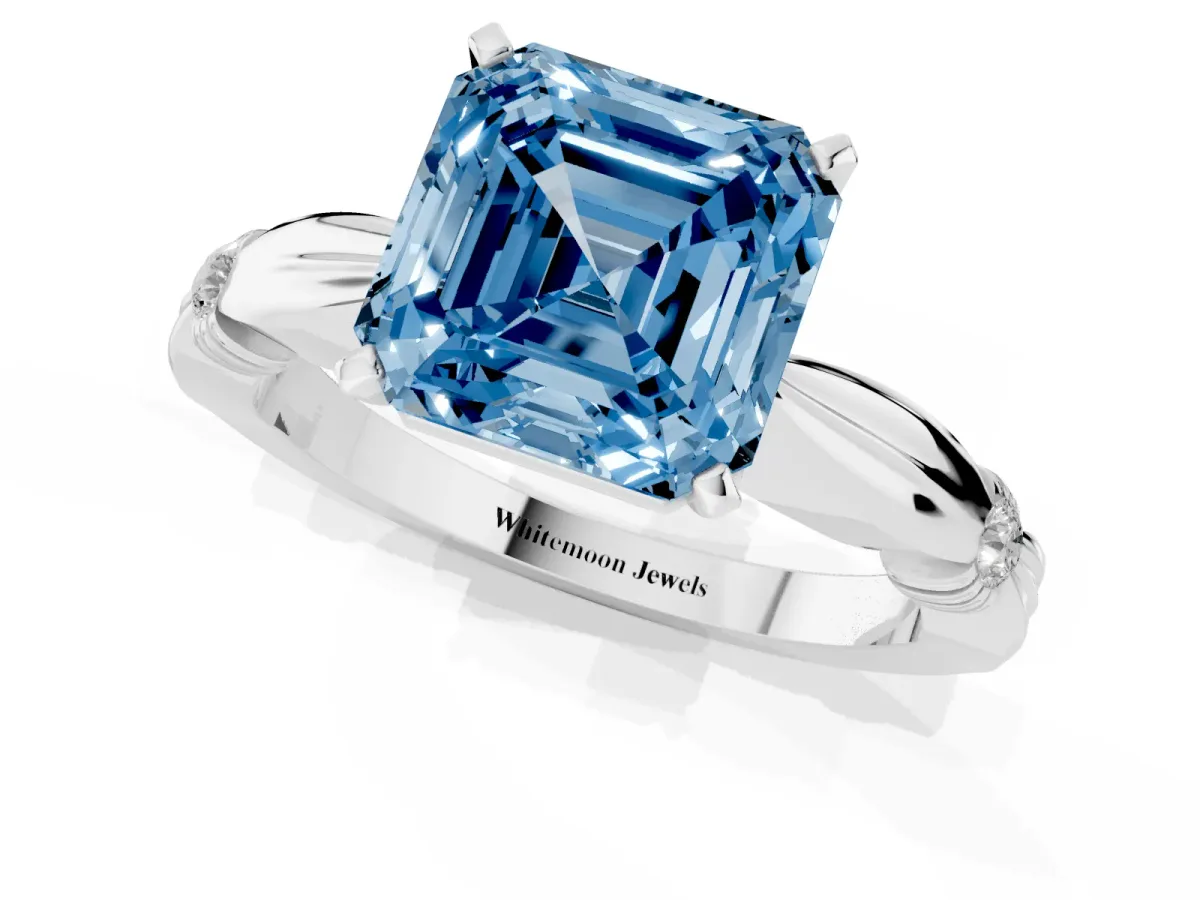 Fancy Blue Asscher Cut Solitaire Diamond Twisted Band with Four-Prong Setting White gold