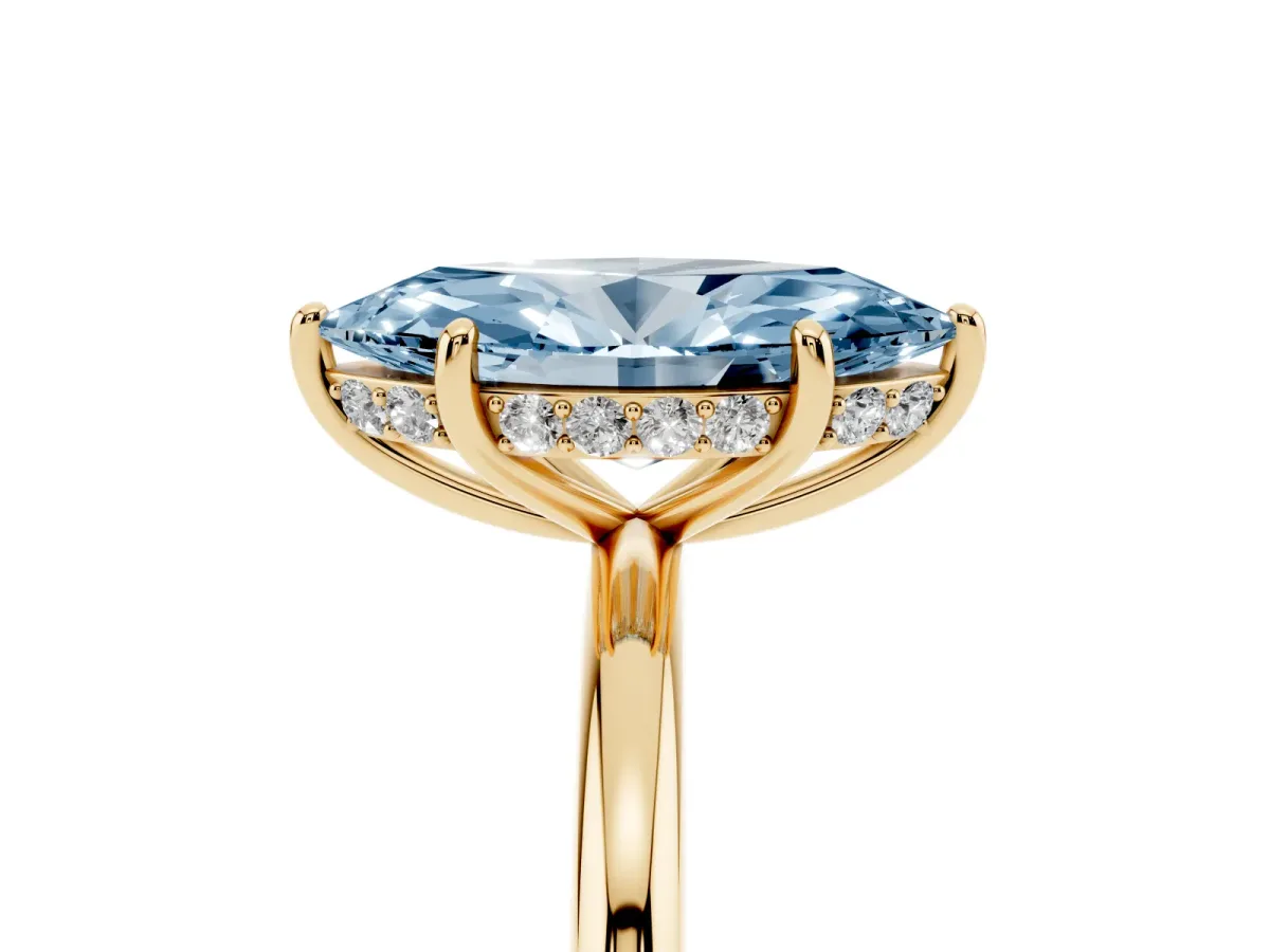Fancy Blue Marquise Cut Solitaire Diamond Ring with a Classic Band and Four-Prong Setting Yellow gold