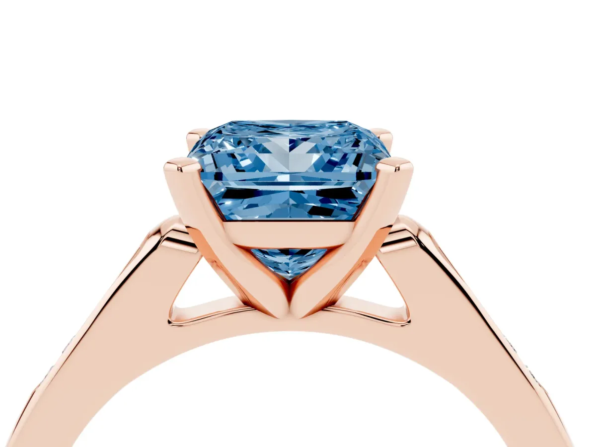 Fancy Blue Princess Cut Diamond Solitaire Ring with Channel Set Round Band and Prong Setting Rose gold