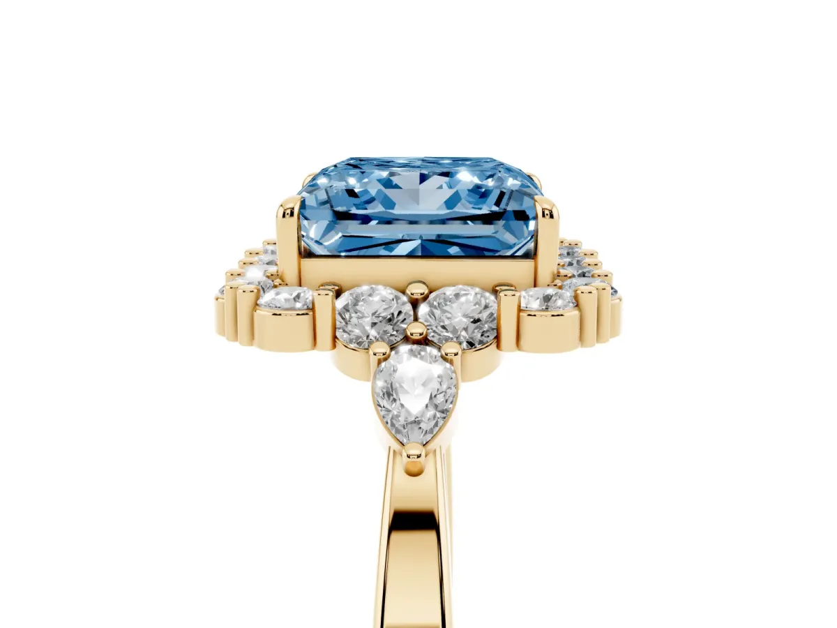 Fancy Blue Princess Cut Diamond Halo Ring with Pear Side Stones and Prong Setting Yellow gold