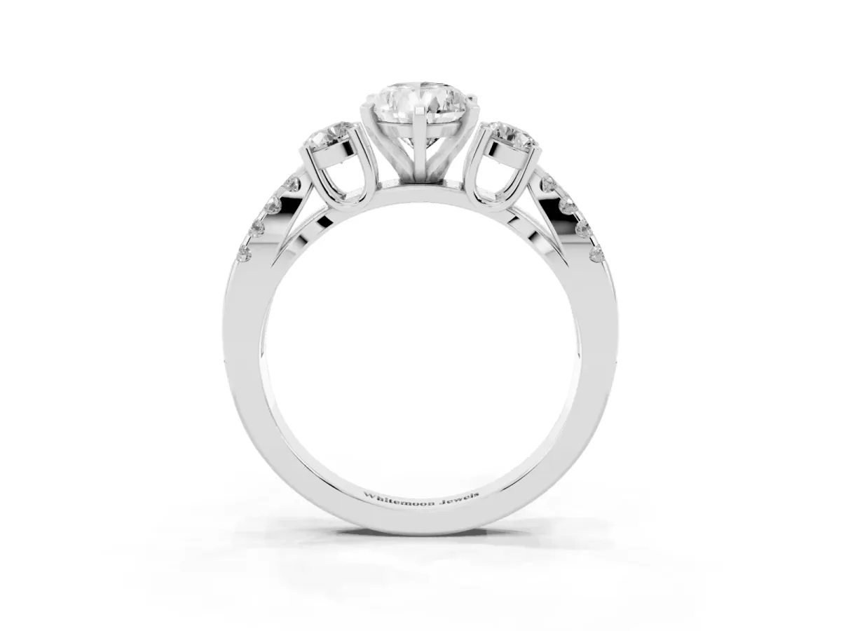 Pear Cut Diamond Three-Stone Ring with Pavé Split Shank and Four-Prong Setting Platinum