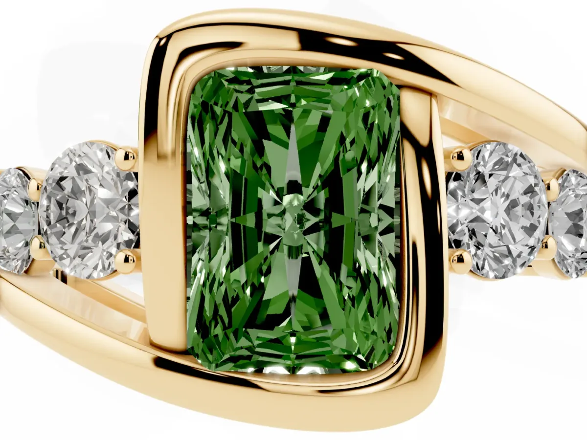 Fancy Green Bezel Set Radiant Cut Diamond Bypass Ring with Round Accents Yellow gold
