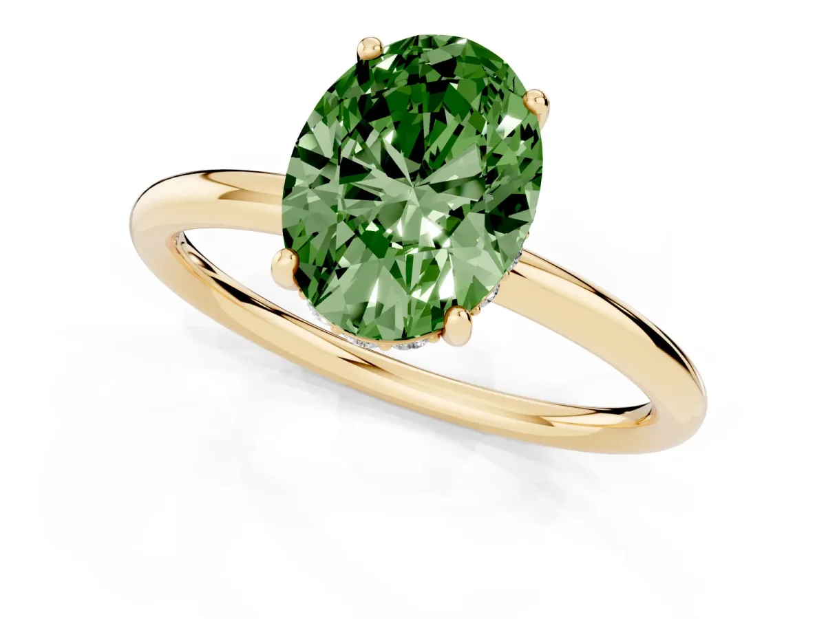 Fancy Green Oval Cut Solitaire Diamond Ring with a Classic Band and Four-Prong Setting Yellow gold