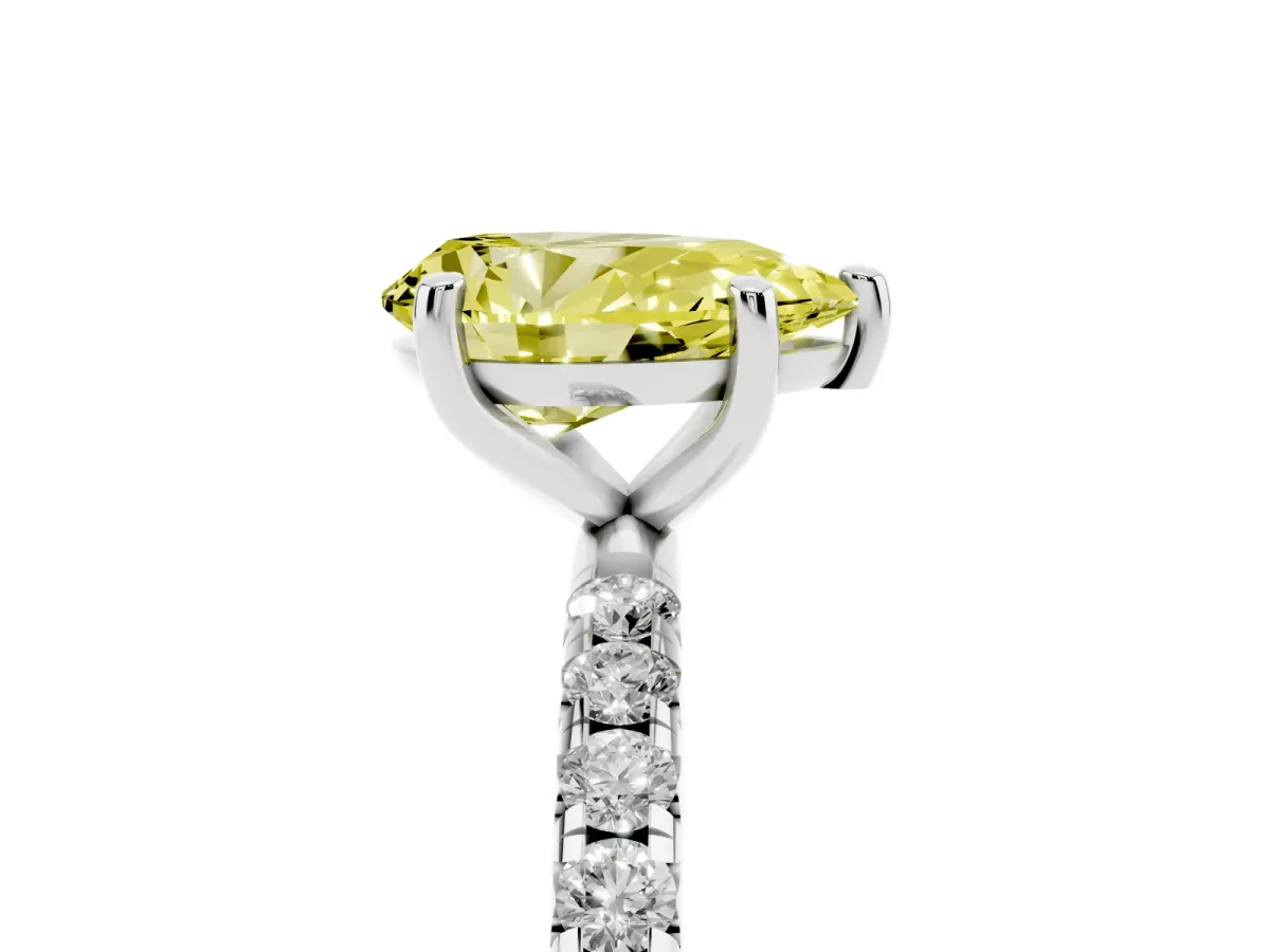 Fancy Yellow Pear Cut Cut Diamond Solitaire Ring with Micro Pave Band and Four Prong Setting Silver