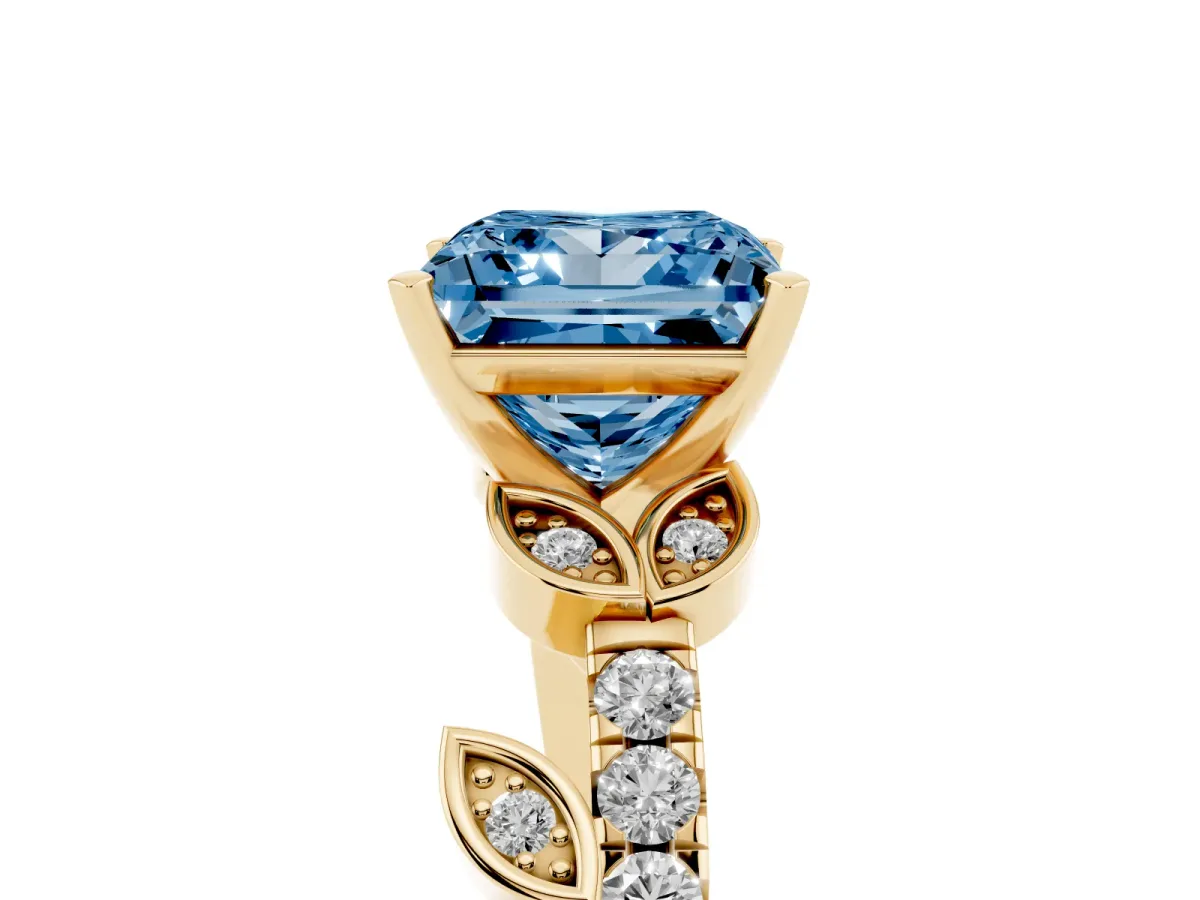 Fancy Blue Princess Cut Solitaire Leaf-Inspired Diamond Ring with Pavé Band and Four-Prong Setting Yellow gold