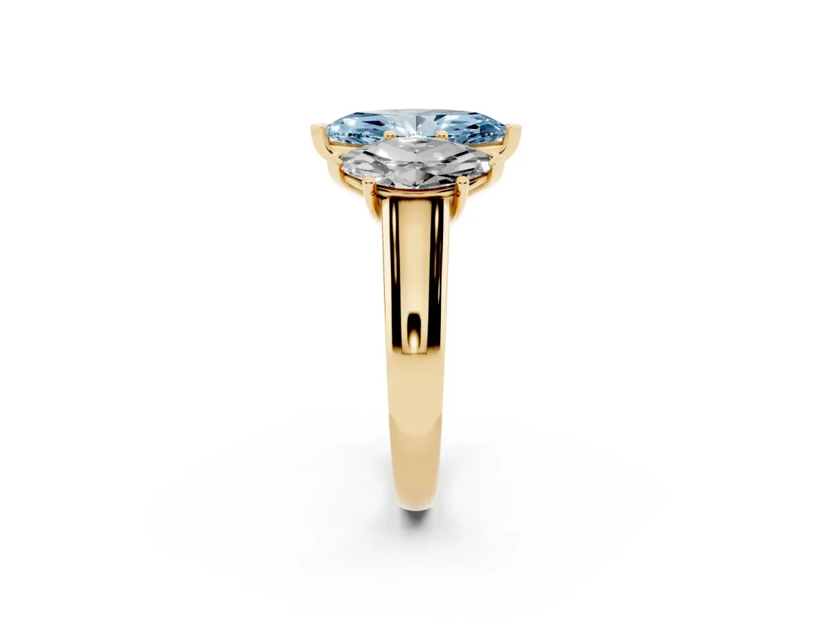 Fancy Blue Marquise Cut Three-Stone Diamond Ring with Prong Setting on a Classic Band Yellow gold