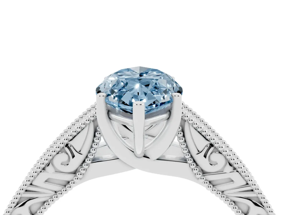 Fancy Blue Marquise Cut Diamond Solitaire Ring with Engraved Band and Four-Prong Setting White gold