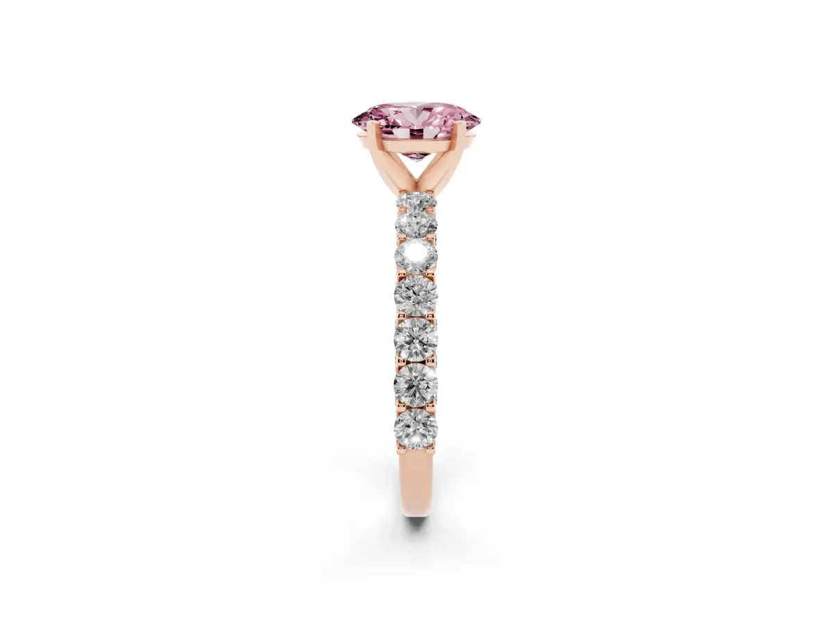Fancy Pink Oval Cut Diamond Solitaire Ring with Shared Prong Pavé Band and Four-Prong Setting Rose gold