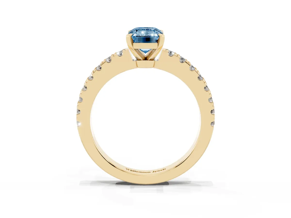 Fancy Blue Emerald Cut Solitaire Diamond with Pavé Band and Four-Prong Setting Yellow gold