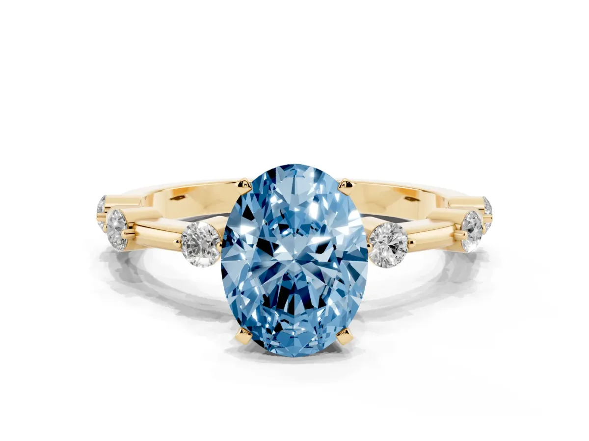 Fancy Blue Oval Cut Solitaire Diamond Ring with Bezel Set Side Stones and Prong Setting Yellow gold