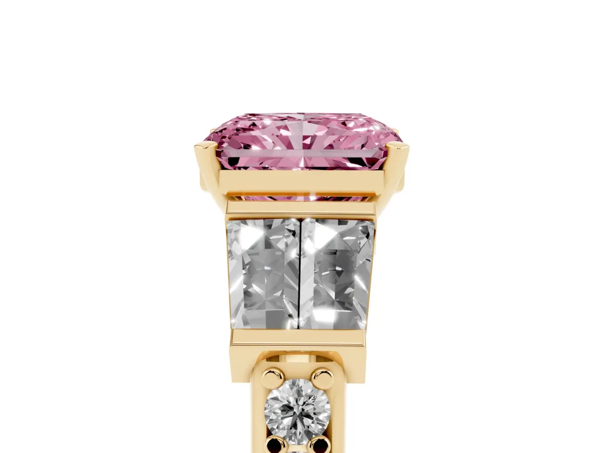 Fancy Pink Radiant Cut Diamond Engagement Ring with Baguette Side Stones and Channel Set Band Yellow gold