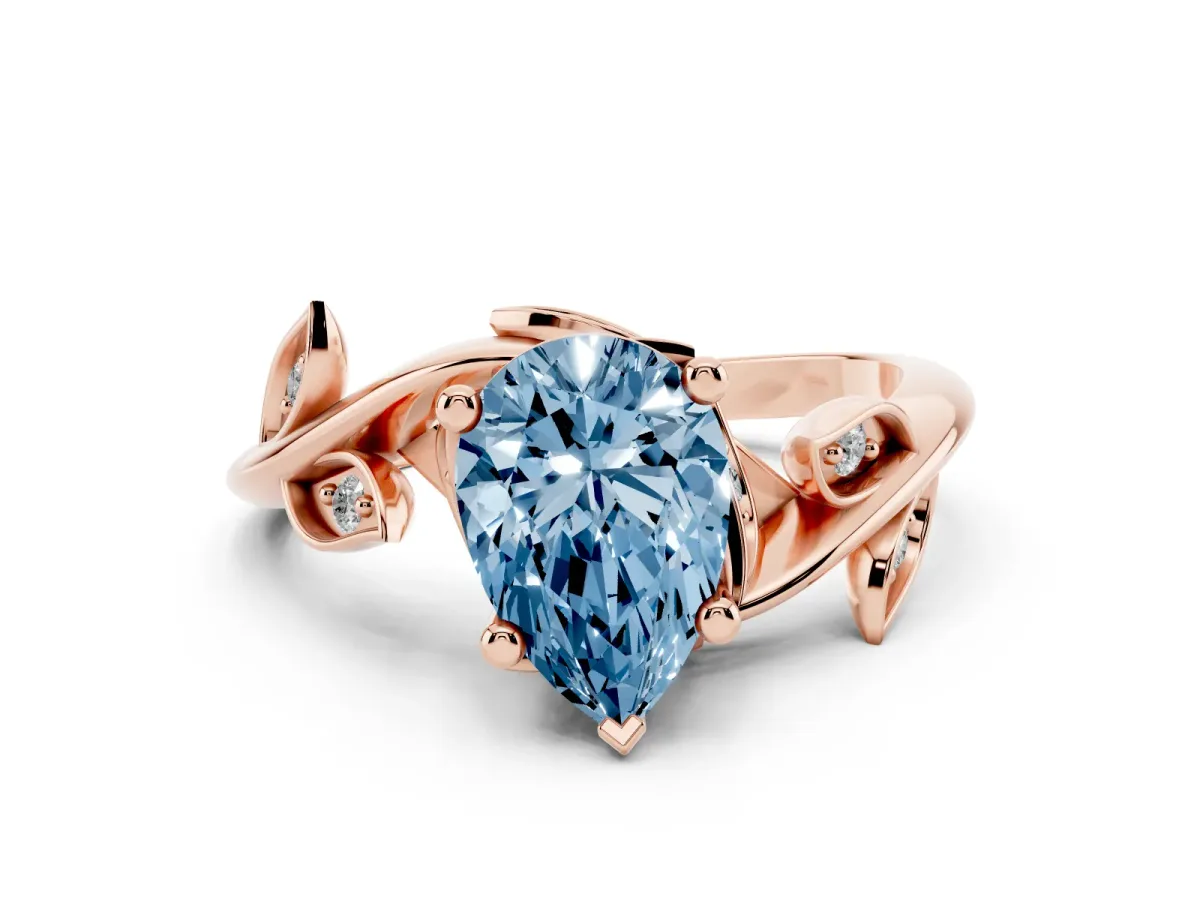 Fancy Blue Pear Cut Solitaire Twist Engagement Ring with Leaf Accents and Prong Setting Rose gold