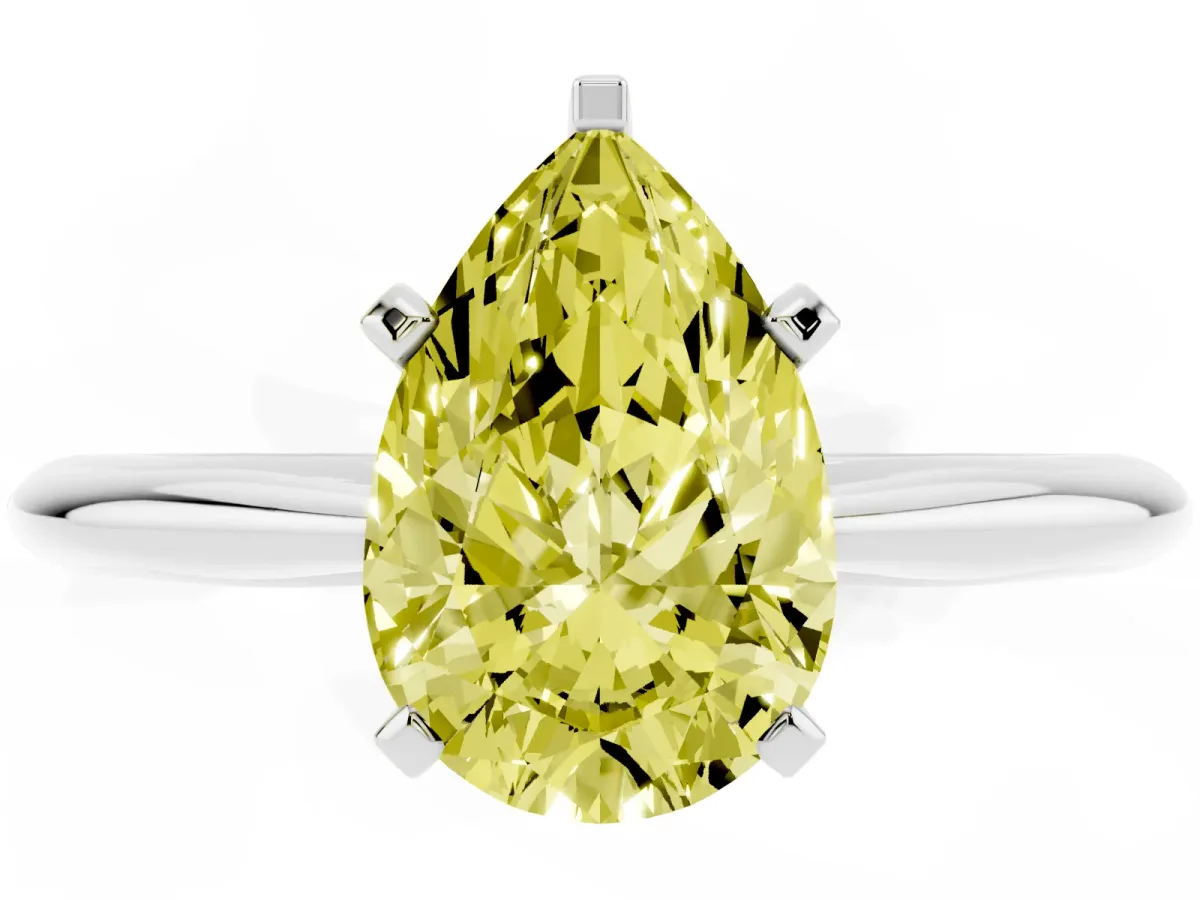 Fancy Yellow Pear Cut Cut Solitaire Ring with Four-Prong Setting on a Classic Band Silver