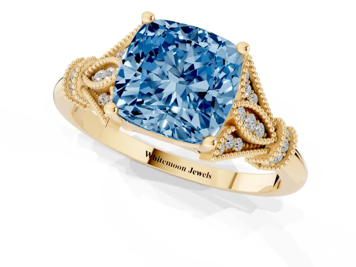 Fancy Blue Cushion Cut Diamond Solitaire Ring with Floral Filigree and Pave Accents Yellow gold