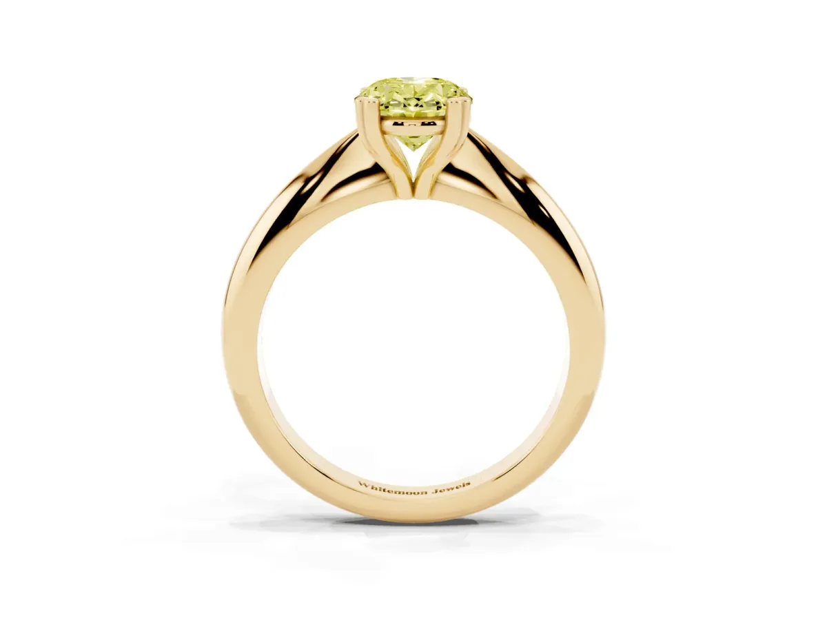 Fancy Yellow Oval Cut Cut Solitaire Engagement Ring with Tapered Band and Four-Prong Setting Yellow gold