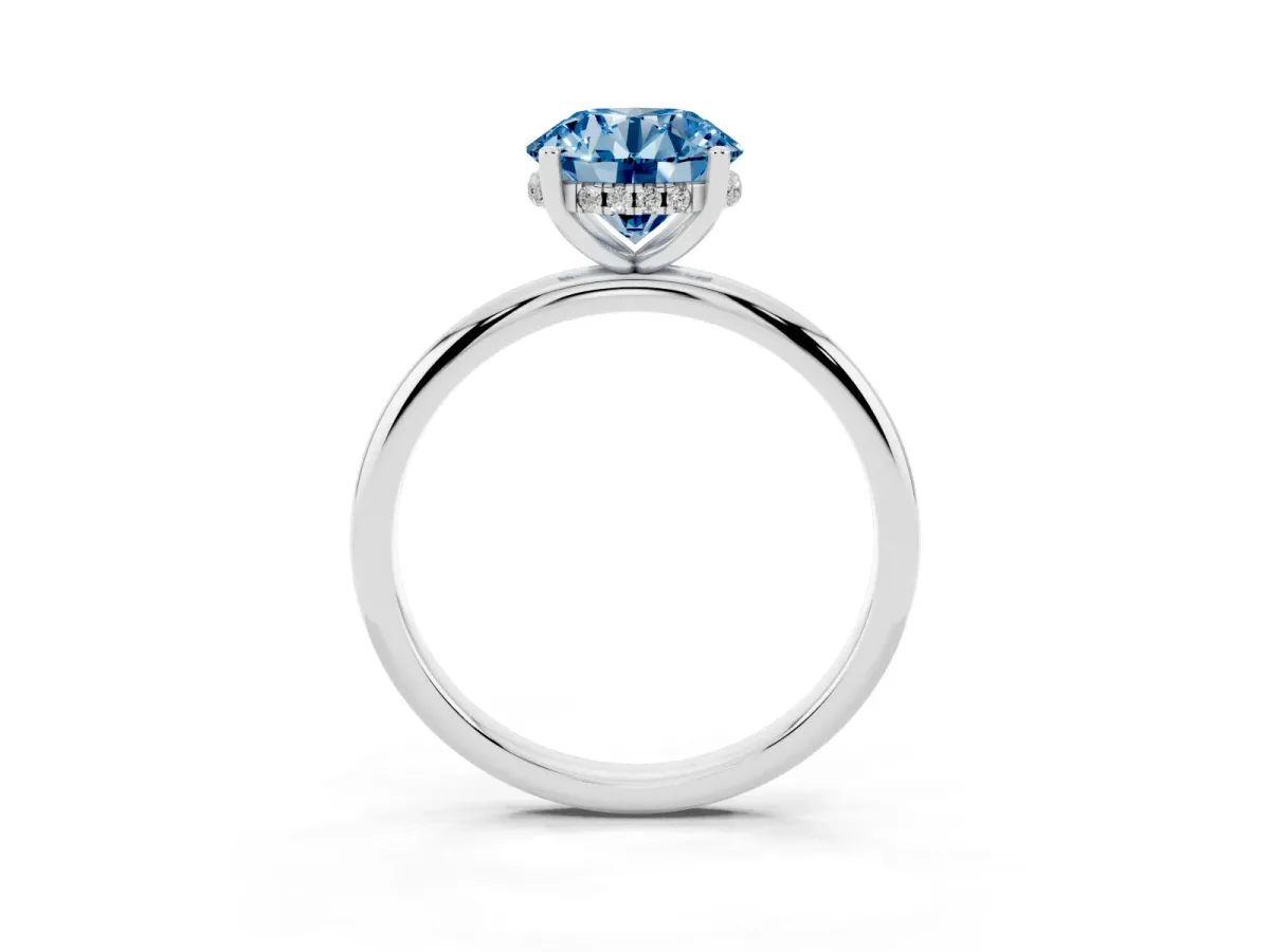 Fancy Blue Round Cut Cut Solitaire Engagement Ring with Four-Prong Setting and Classic Band Silver