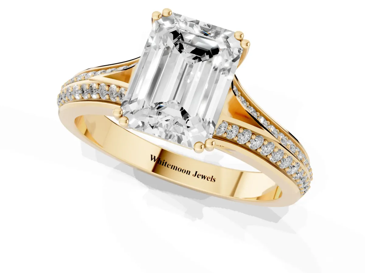 Emerald Cut Diamond Split Shank Engagement Ring with Pavé Band Yellow gold