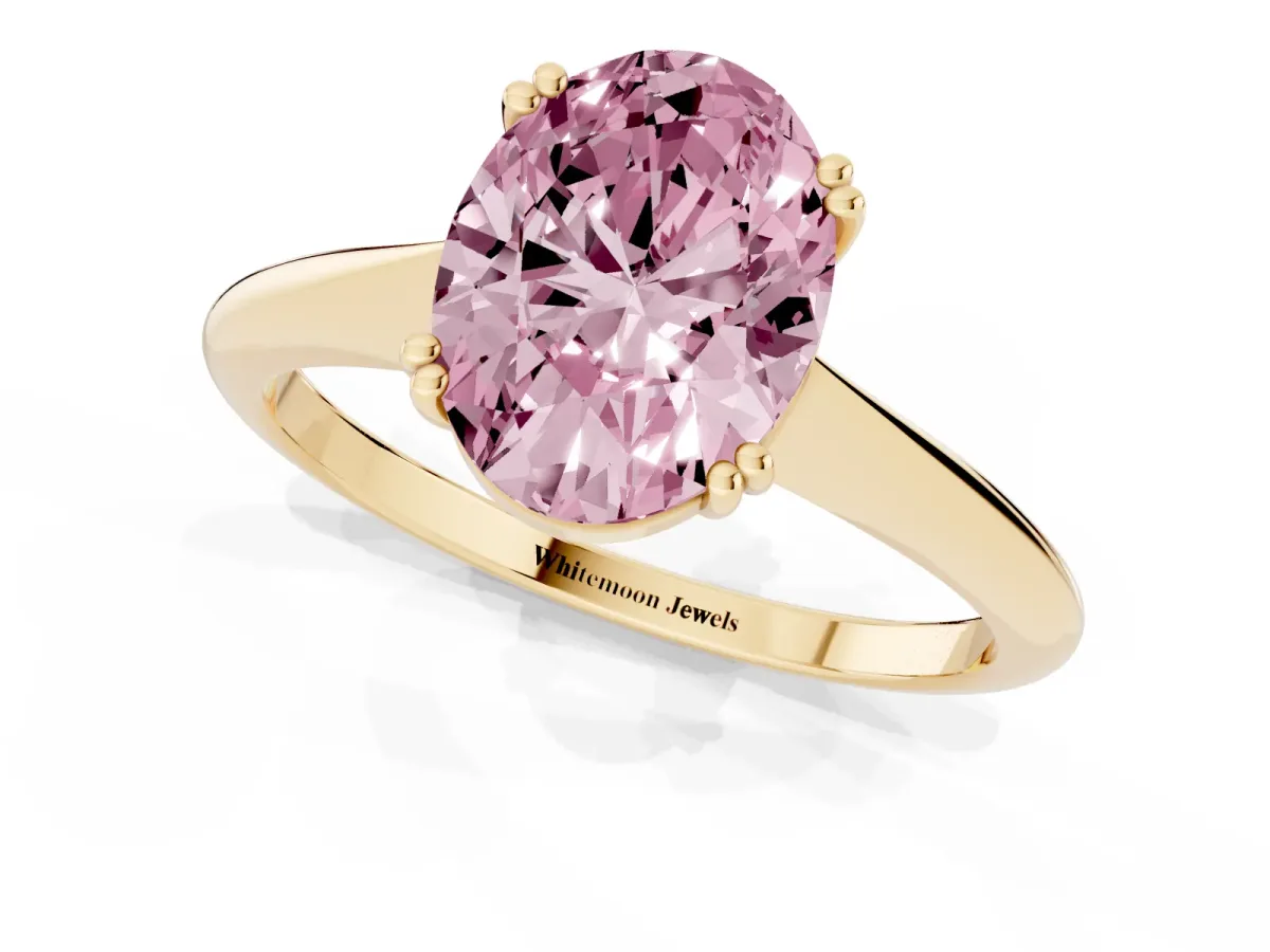 Fancy Pink Oval Cut Solitaire Diamond Ring with Six-Prong Setting and Classic Band Yellow gold