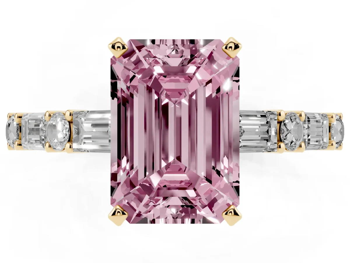 Fancy Pink Emerald Cut Diamond Solitaire with Side Baguettes and Channel Set Band Yellow gold