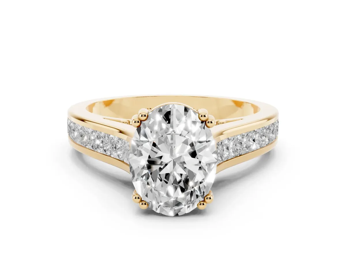 Oval Cut Cut Channel Set Solitaire Engagement Ring with Prong Setting Yellow gold