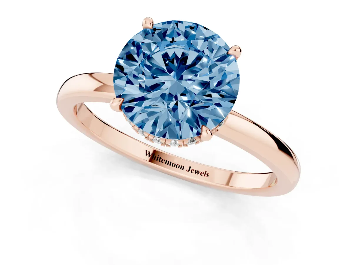 Fancy Blue Round Cut Solitaire Engagement Ring with Cathedral Band and Four-Prong Setting Rose gold