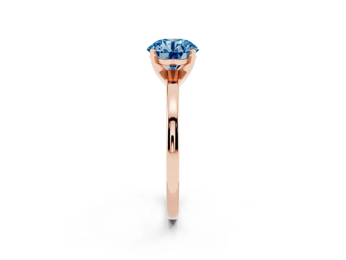 Fancy Blue Round Cut Solitaire Diamond Engagement Ring with Four-Prong Setting on a Classic Band Rose gold