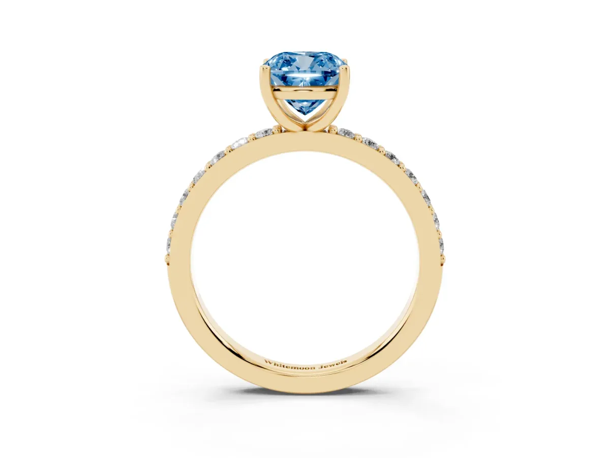 Fancy Blue Cushion Cut Cut Diamond Solitaire with Pave Band and Four-Prong Setting Yellow gold