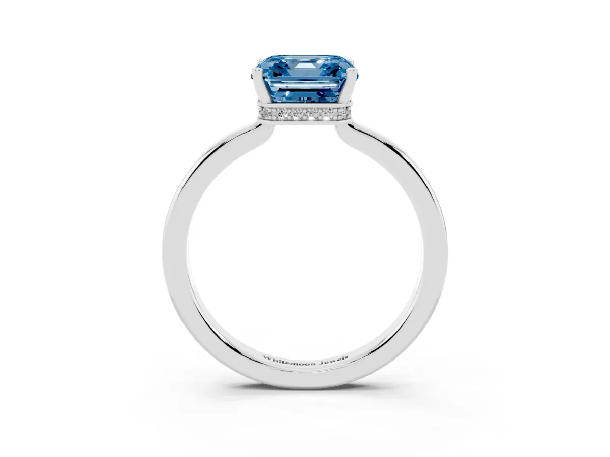 Fancy Blue Asscher Cut Cut Solitaire Engagement Ring with Four-Prong Setting on a Classic Band Silver