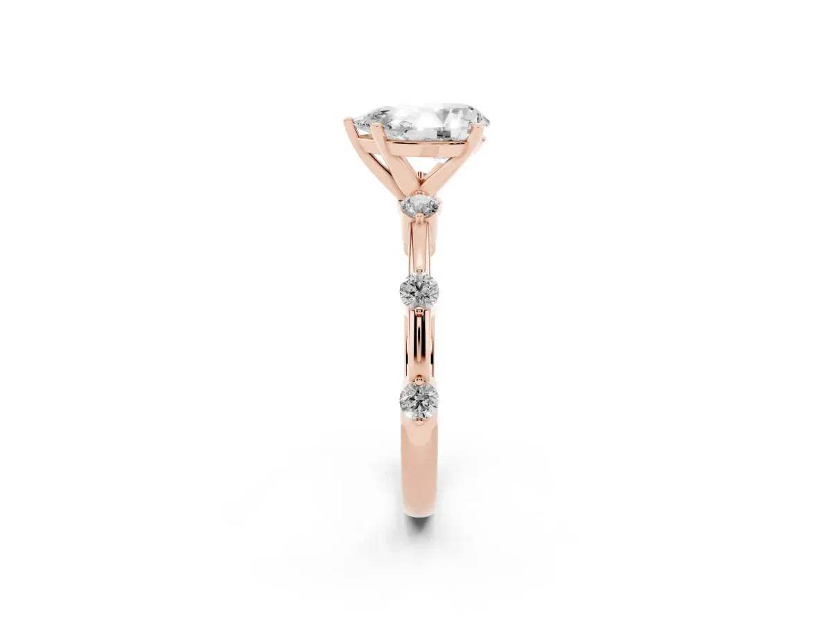 Pear Cut Solitaire Diamond Ring with Bezel Set Side Stones and Prong Setting Rose gold