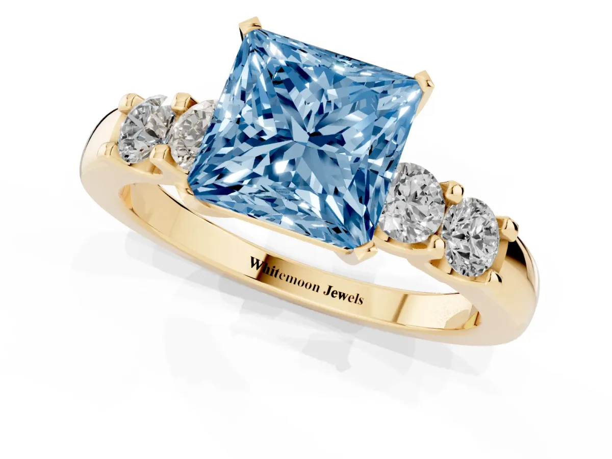 Fancy Blue Princess Cut Brilliant Cut Diamond Five-Stone Prong Set Engagement Ring with Channel Band Yellow gold