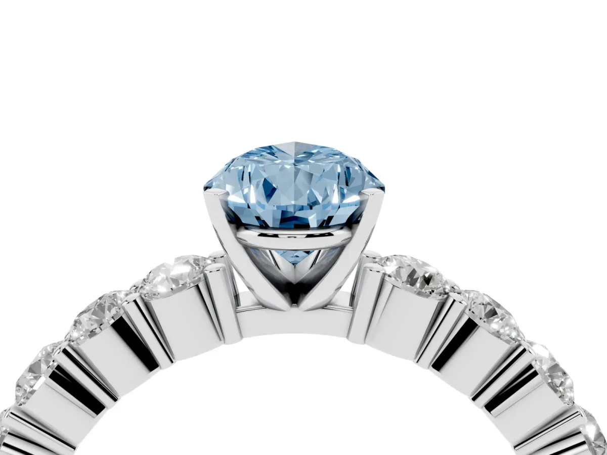 Fancy Blue Pear Cut Diamond Solitaire Ring with Shared Prong Round Side Stones Platinum
