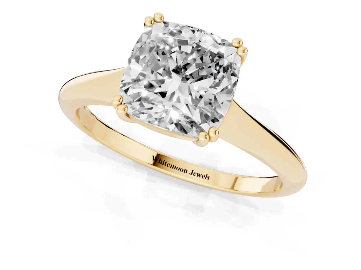 Cushion Cut Solitaire Diamond Ring with Six-Prong Setting and Classic Band Yellow gold