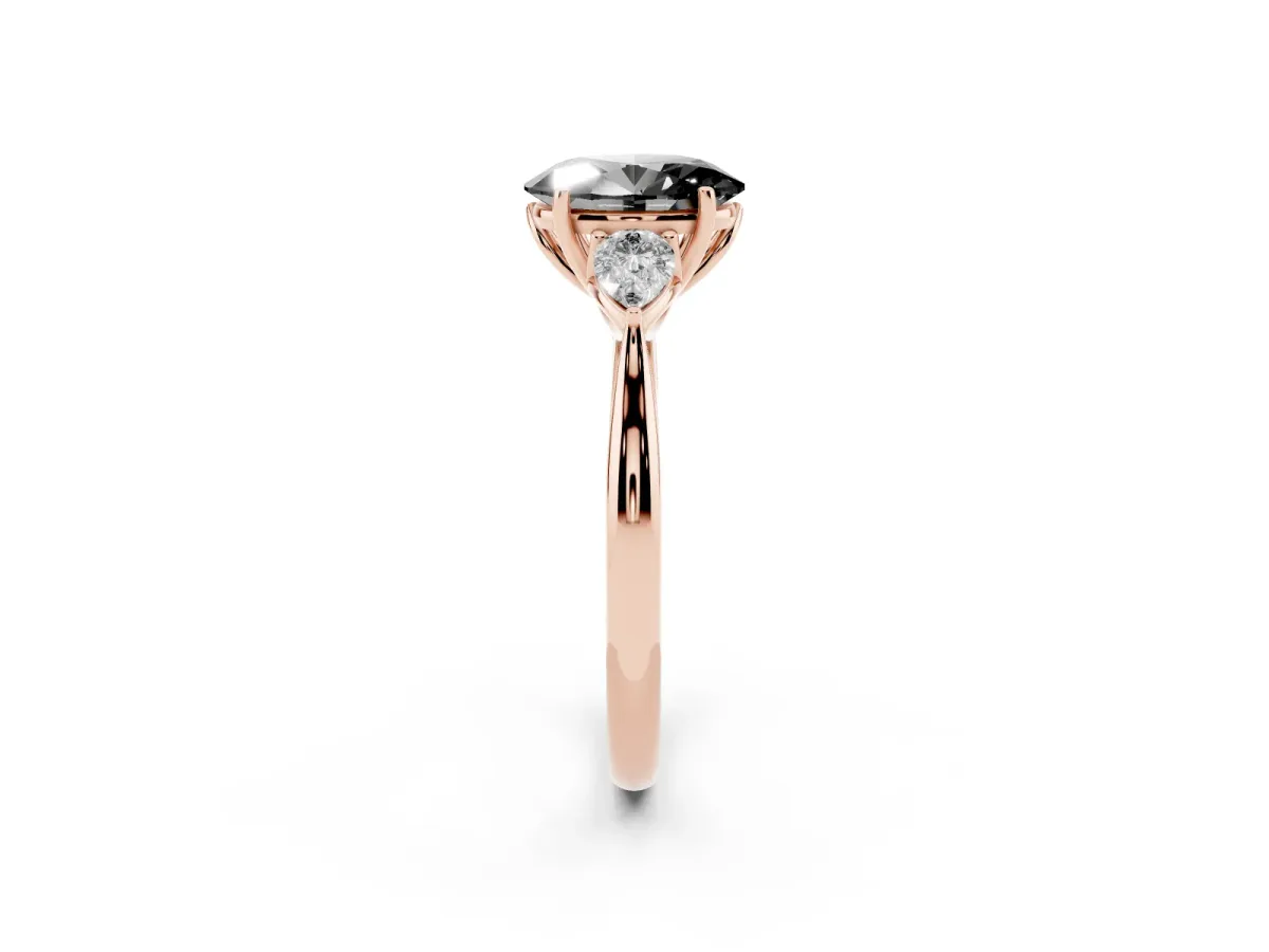 Fancy Black Oval Cut Diamond Three-Stone Ring with Pear Side Stones and Prong Setting Rose gold