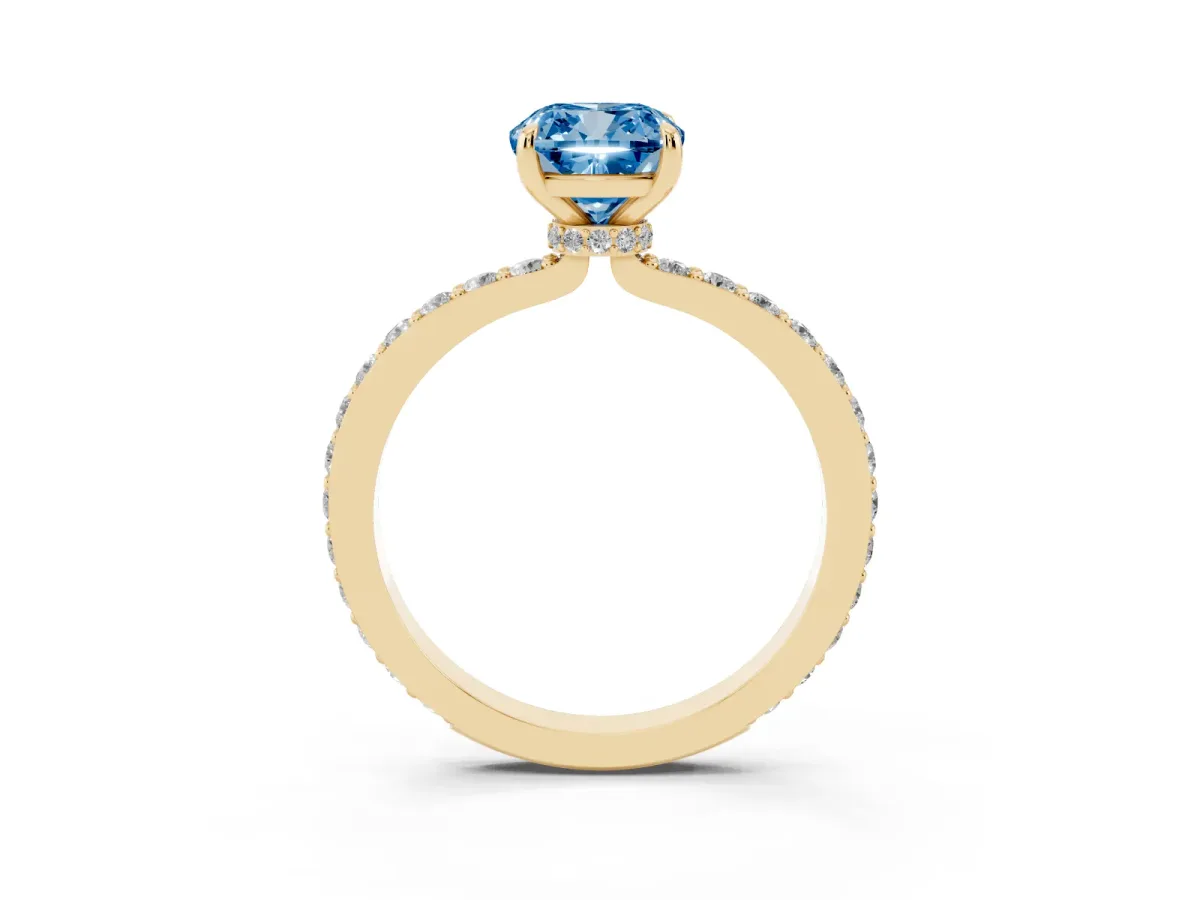 Fancy Blue Cushion Cut Diamond Solitaire Engagement Ring with Pavé Band and Four-Prong Setting Yellow gold