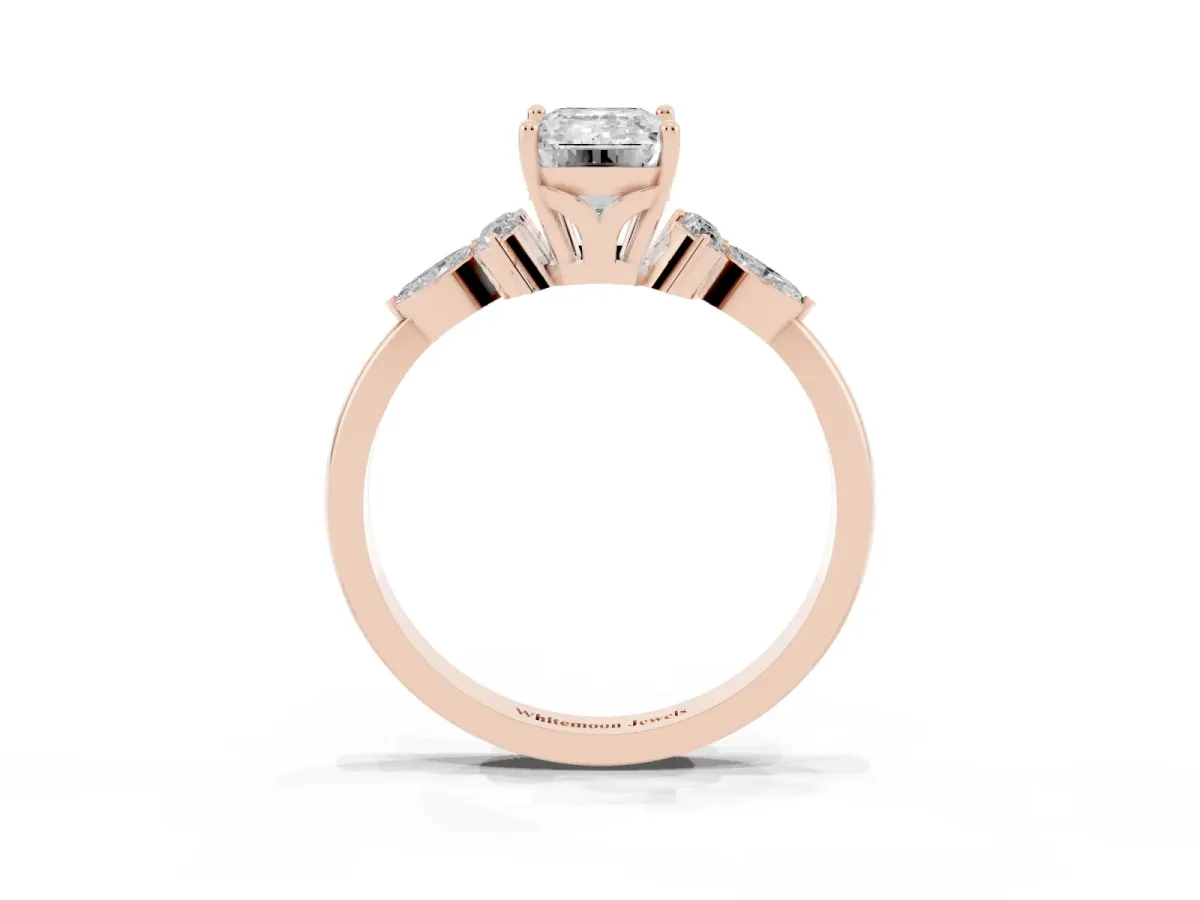 Emerald Cut Brilliant Diamond Solitaire Ring with Pear Side Stones and Four-Prong Setting Rose gold