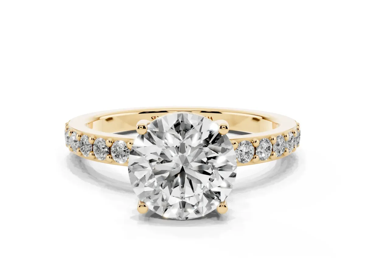 Round Cut Cut Diamond Solitaire with Pave Band and Four-Prong Setting Yellow gold