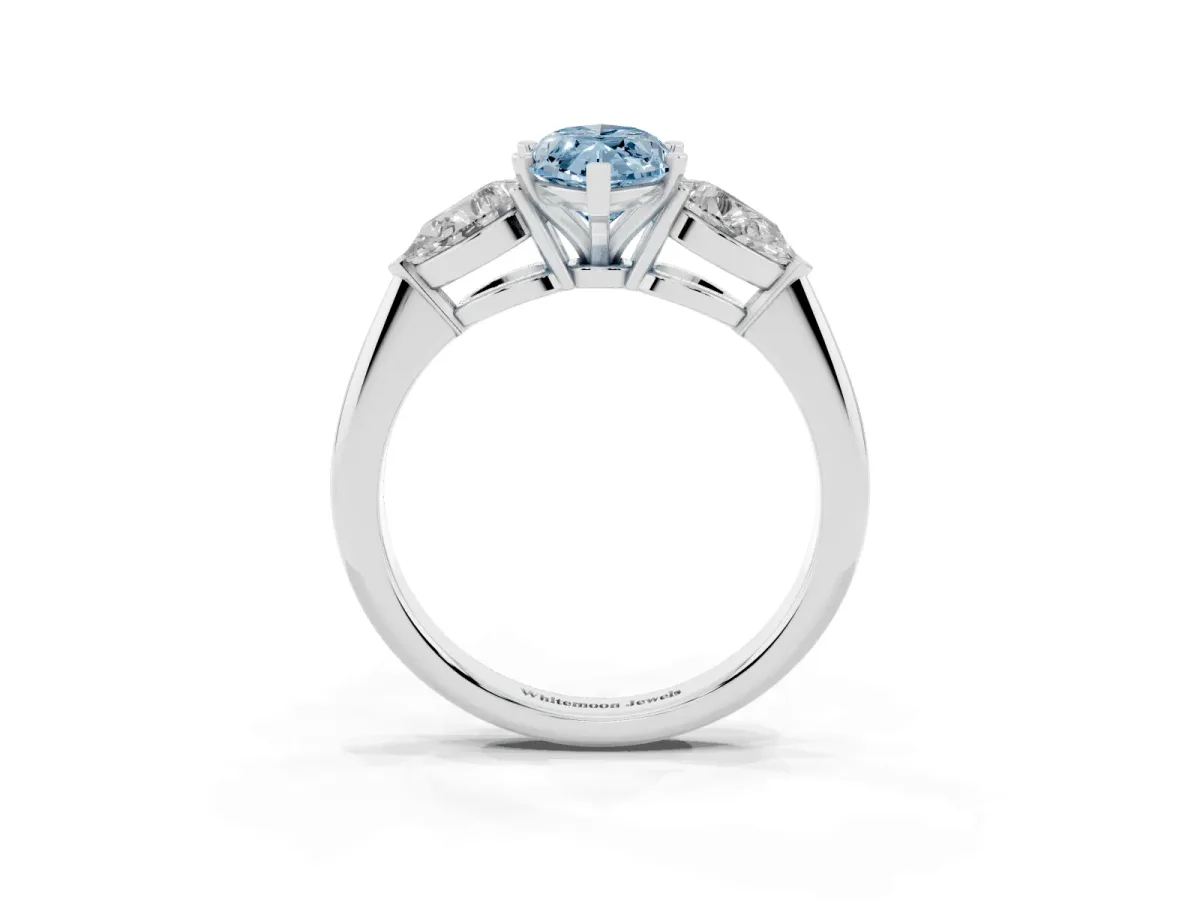 Fancy Blue Three-Stone Marquise Cut Diamond Ring with Pear Side Stones and Four-Prong Setting Silver