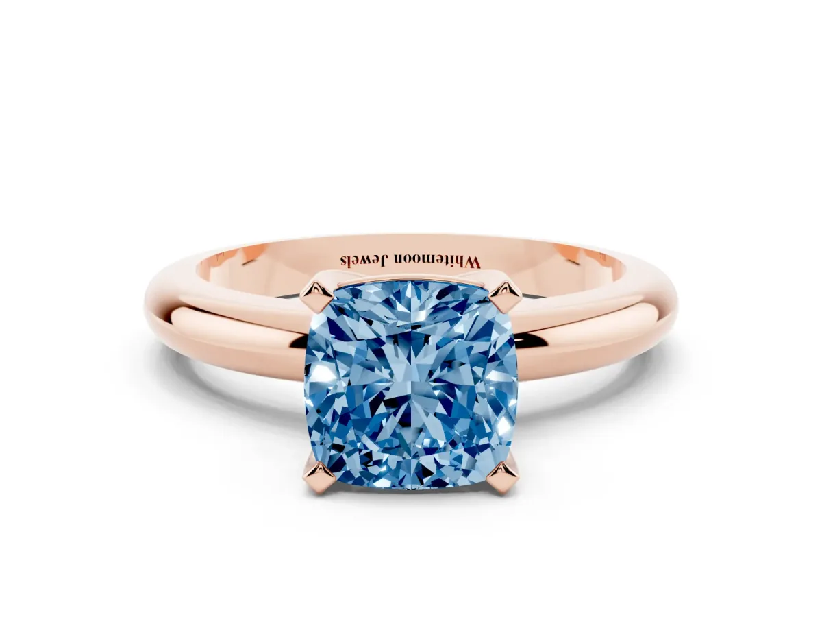 Fancy Blue Cushion Cut Diamond Solitaire Engagement Ring with Round Band and Four-Prong Setting Rose gold