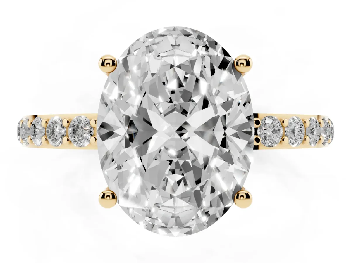 Oval Cut Diamond Solitaire Ring with Round Pavé Shoulders and Prong Setting Yellow gold
