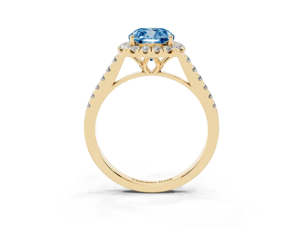 Fancy Blue Cushion Cut Halo Pavé Diamond Engagement Ring with Four-Prong Setting Yellow gold