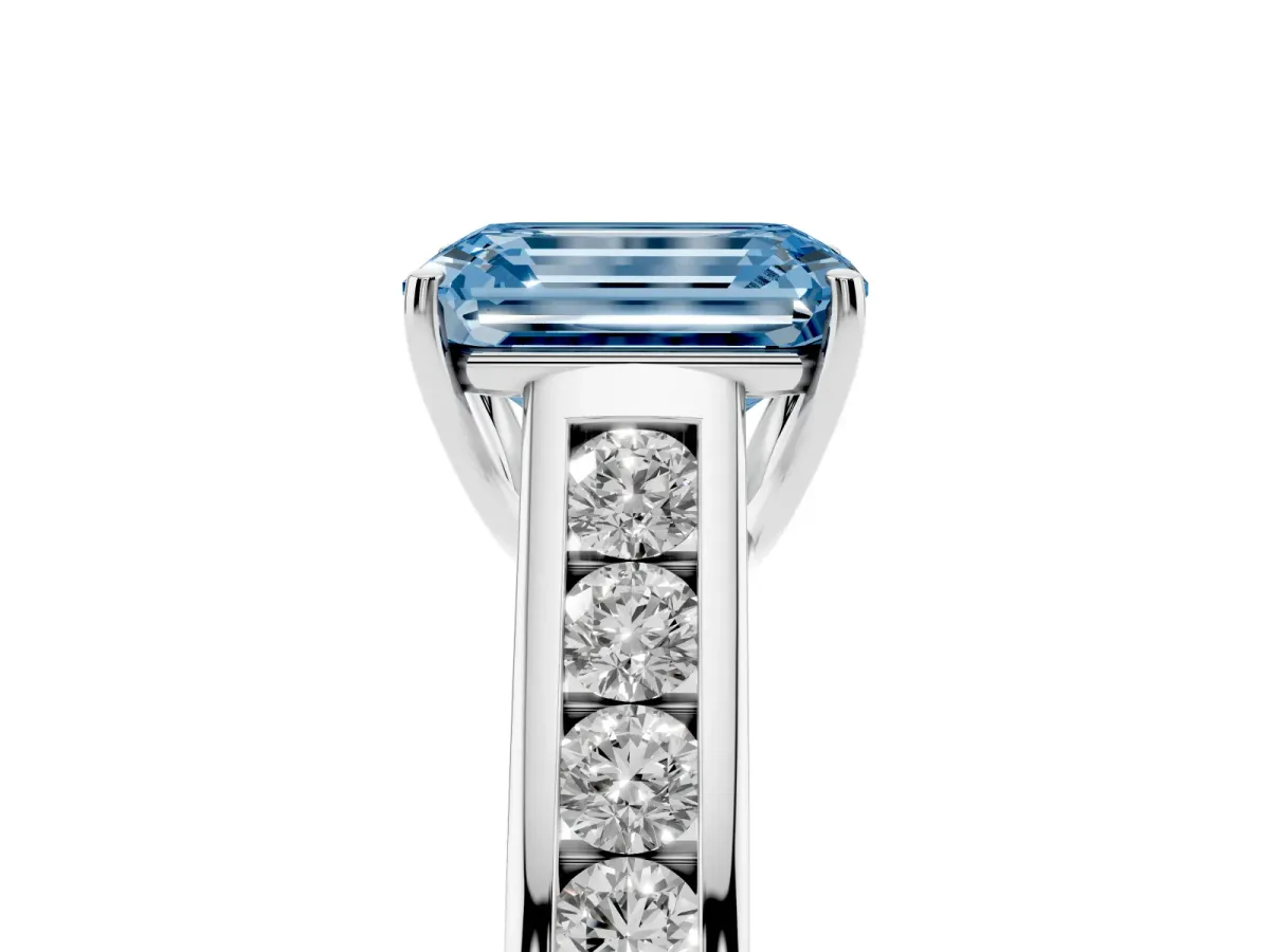 Fancy Blue Emerald Cut Solitaire Channel-Set Diamond Engagement Ring with Four-Prong Setting Silver