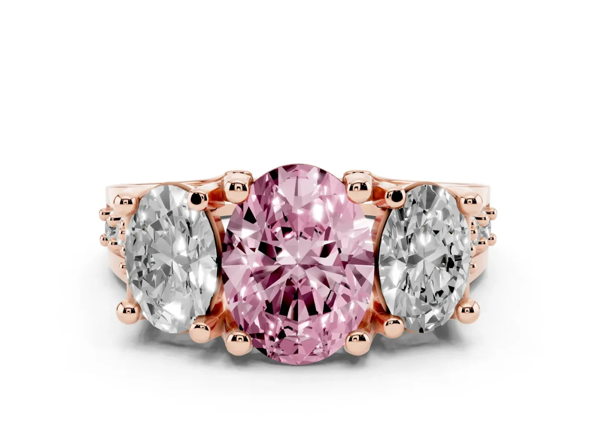 Fancy Pink Oval Cut Diamond Three-Stone Ring with Channel Set Band and Four-Prong Setting Rose gold