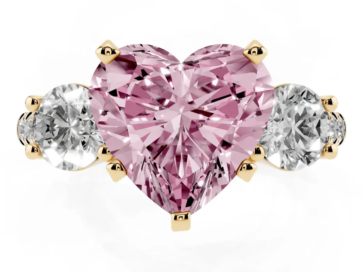 Fancy Pink Three-Stone Heart Cut Diamond Pavé Band with Four-Prong Setting Yellow gold