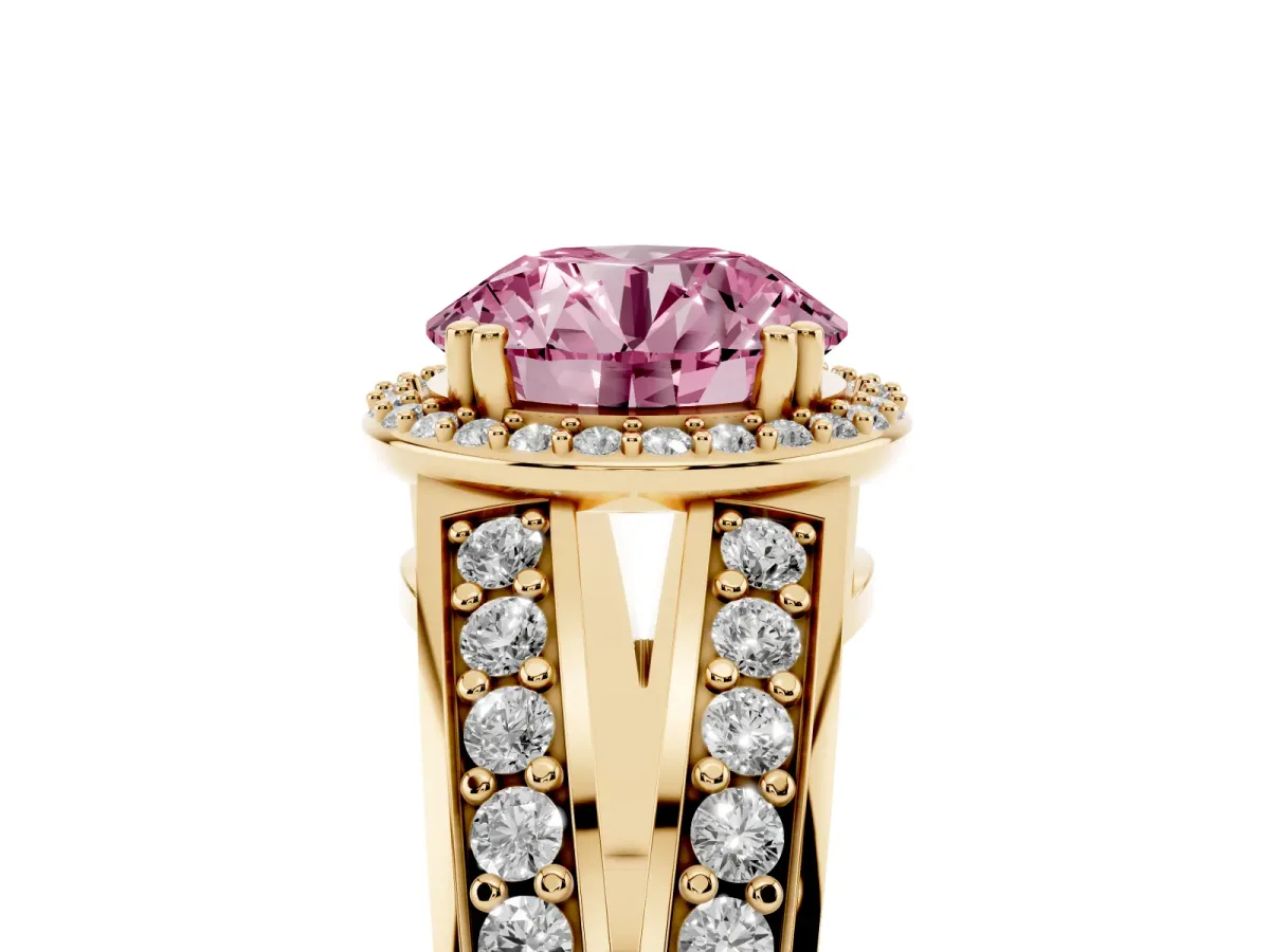 Fancy Pink Round Cut Diamond Halo Ring with Split Shank Pavé Band and Four-Prong Setting Yellow gold