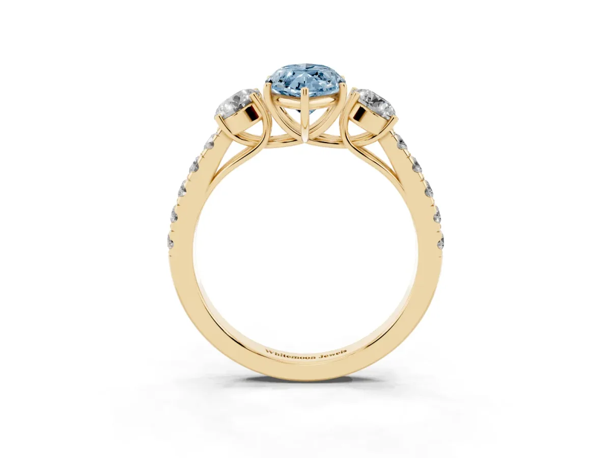 Fancy Blue Marquise Cut Cut Diamond Three-Stone Ring with Round Side Stones and Pavé Band Yellow gold
